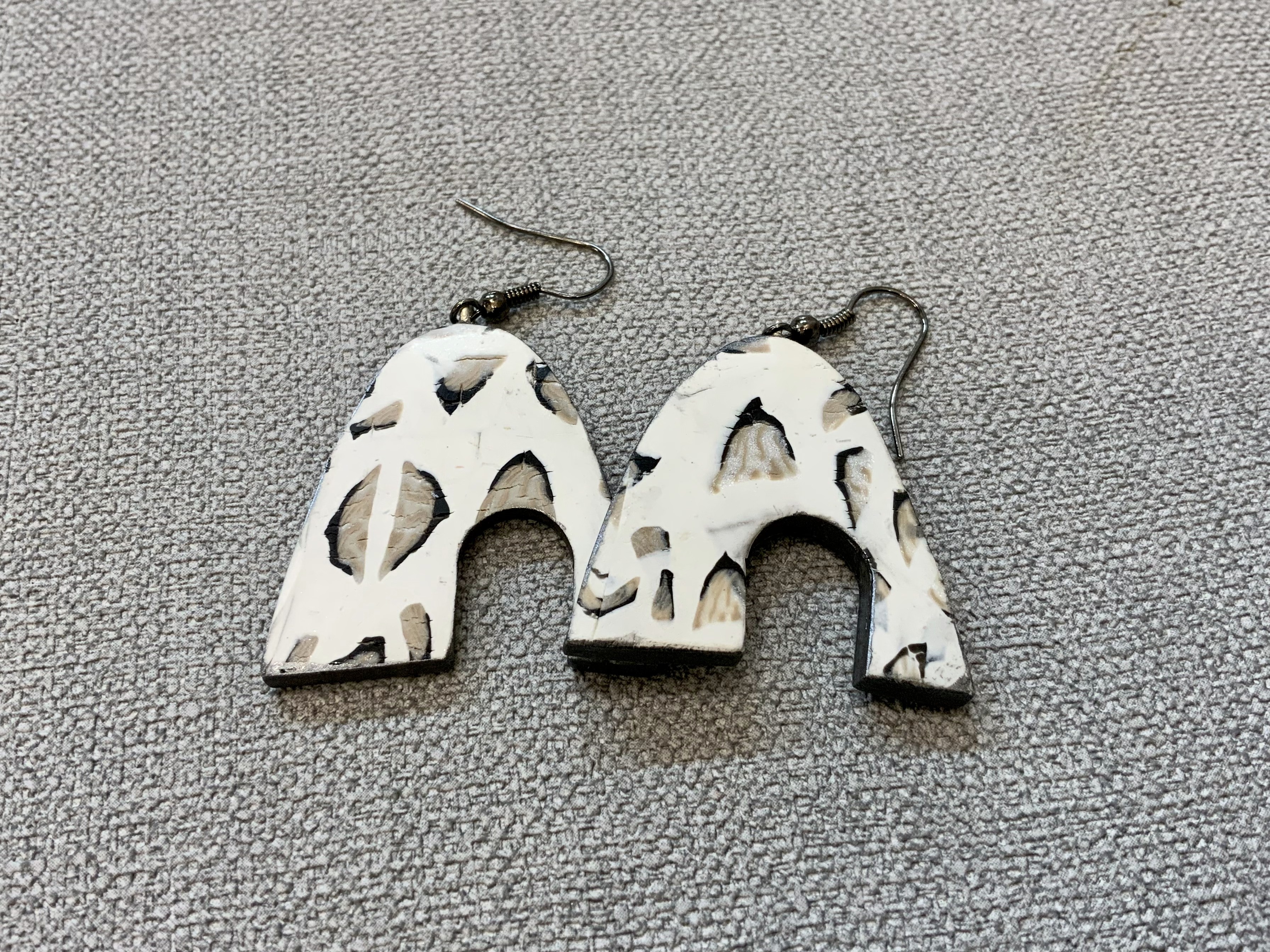 Snow deals leopard earrings