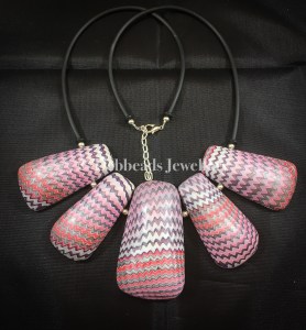 5 Hollow pink toned missioni beads - cord and clasp